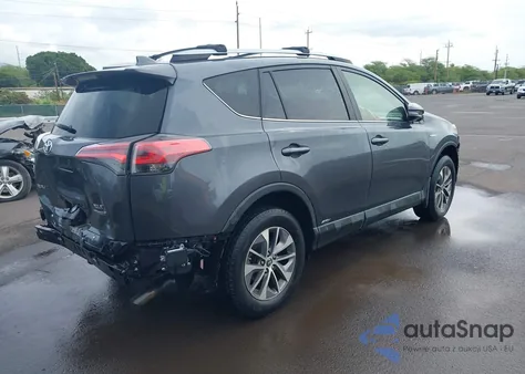 2017 Toyota Rav4 Hybrid Xle z USA, uszkodzony, nr VIN JTMRJREV2HD136275